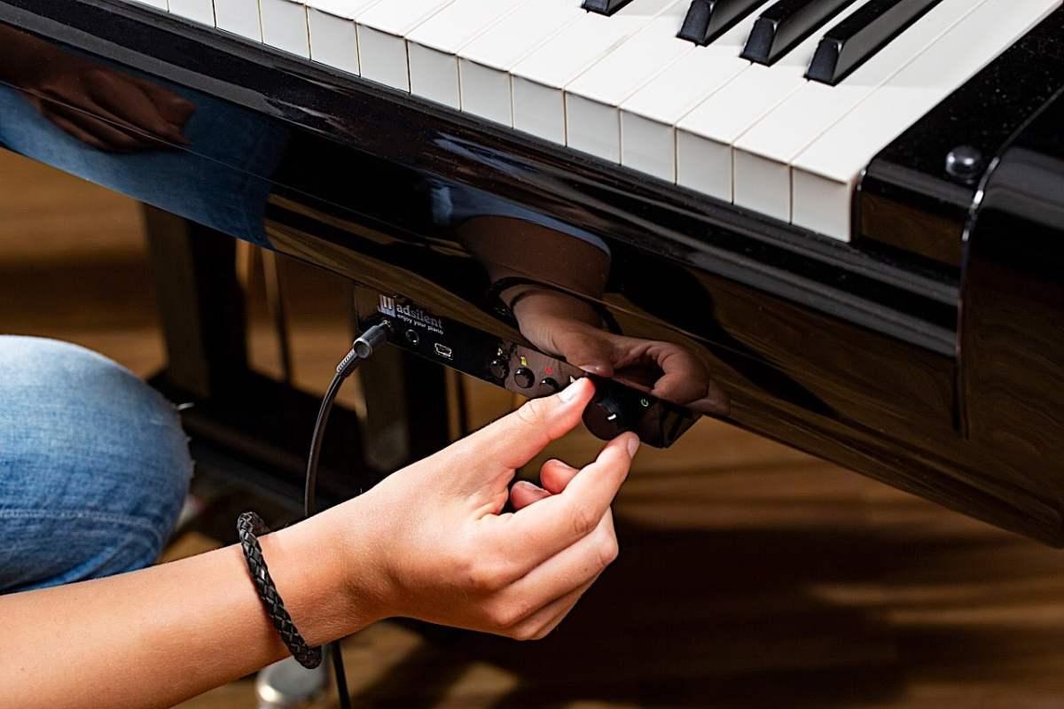 Sistema Adsilent per pianoforte a coda con seconda barra scappamento